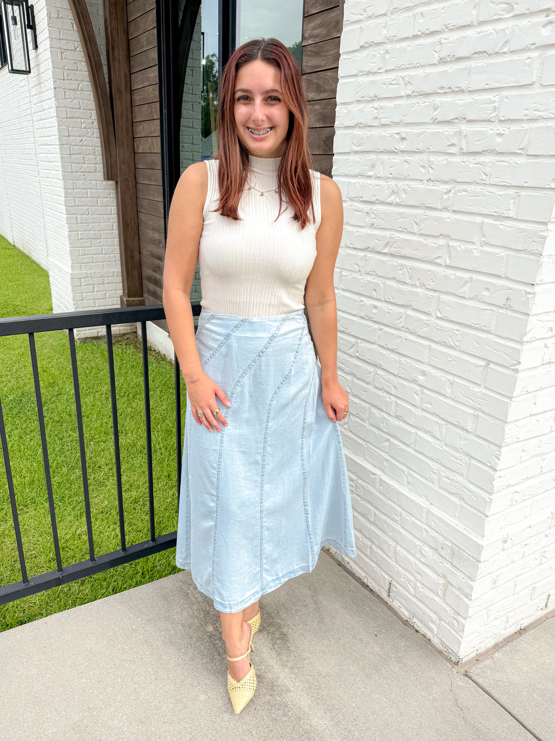THE SCULPTED DIAGONAL DENIM MIDI SKIRT