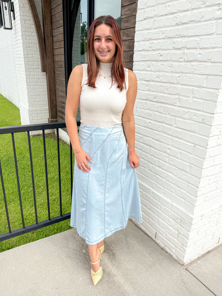 THE SCULPTED DIAGONAL DENIM MIDI SKIRT
