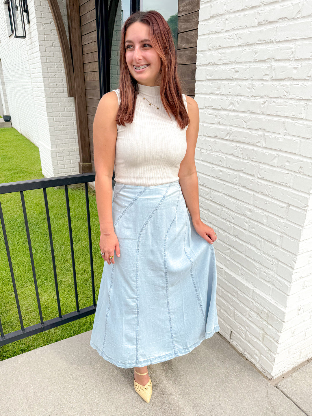 THE SCULPTED DIAGONAL DENIM MIDI SKIRT