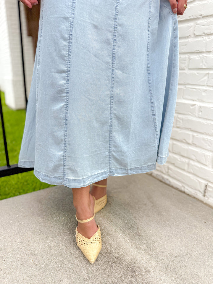 THE SCULPTED DIAGONAL DENIM MIDI SKIRT