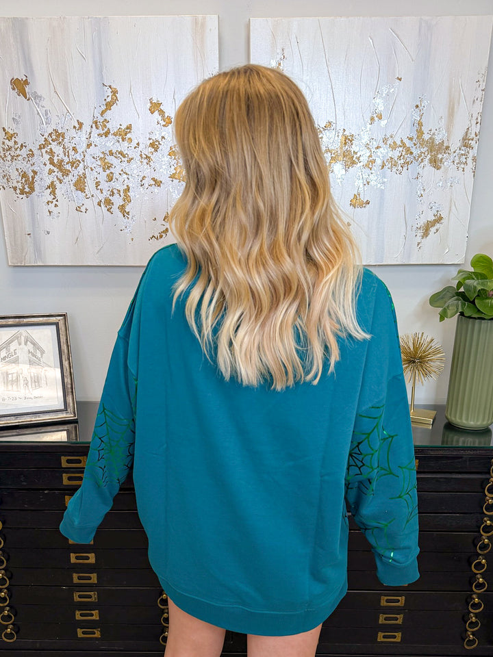 GLOWING WEB GLAM SWEATSHIRT