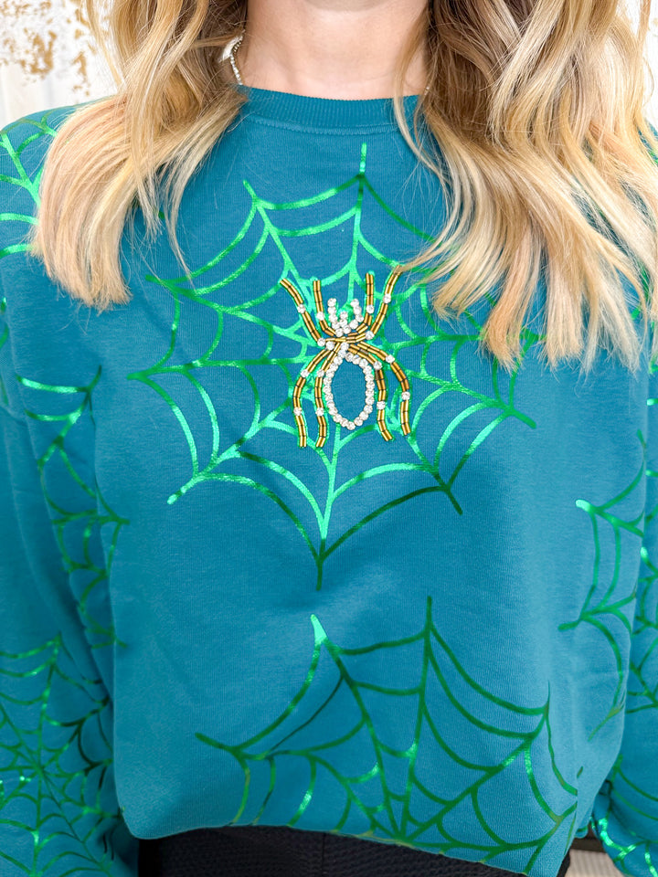 GLOWING WEB GLAM SWEATSHIRT