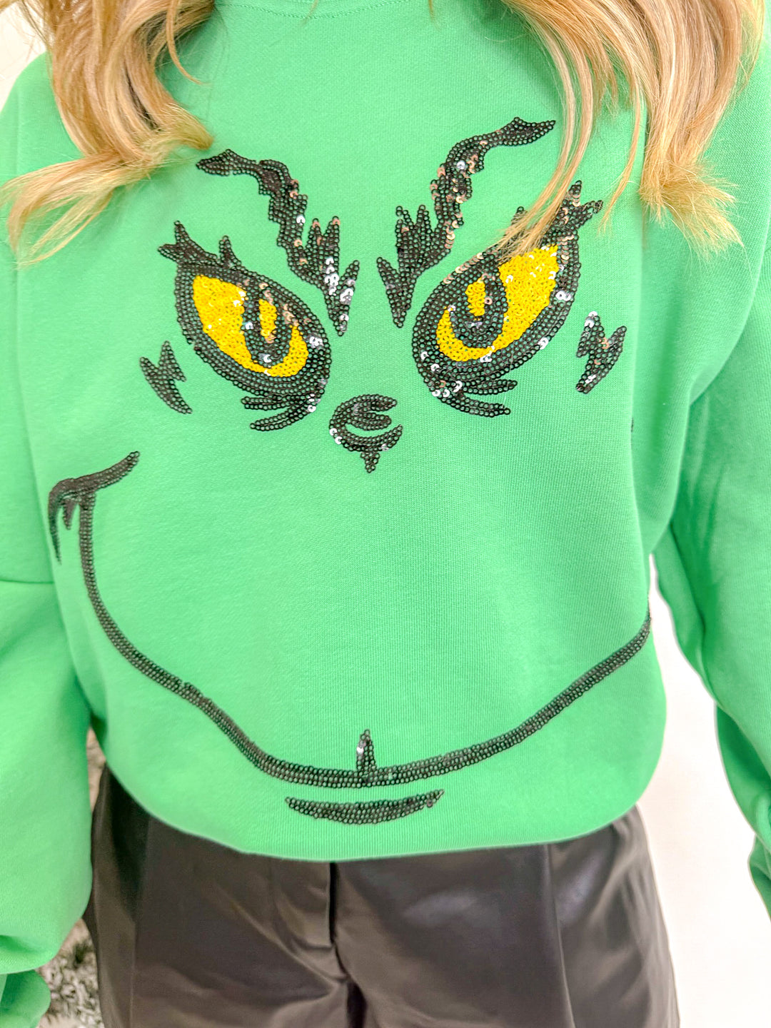 YOU'RE A MEAN ONE SEQUIN SWEATSHIRT