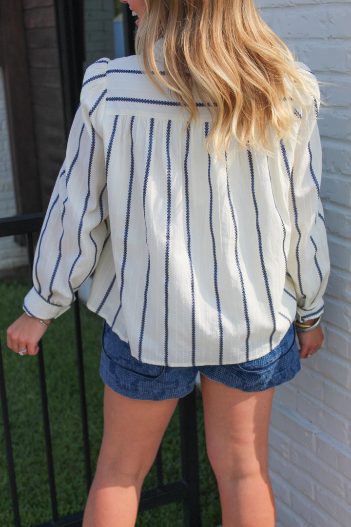 RUFFLE AROUND BUTTON DOWN STRIPED BLOUSE