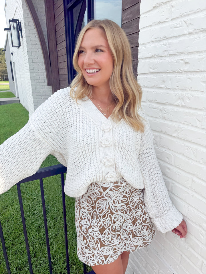 THE DARLING CREAM BUTTON DOWN CARDIGAN