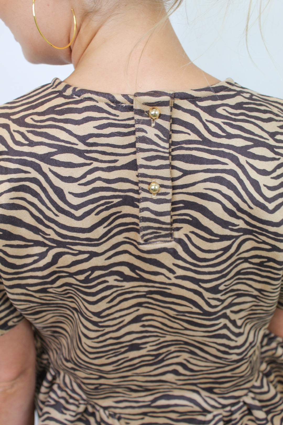 TIGER QUEEN SUEDE PEPLUM TOP