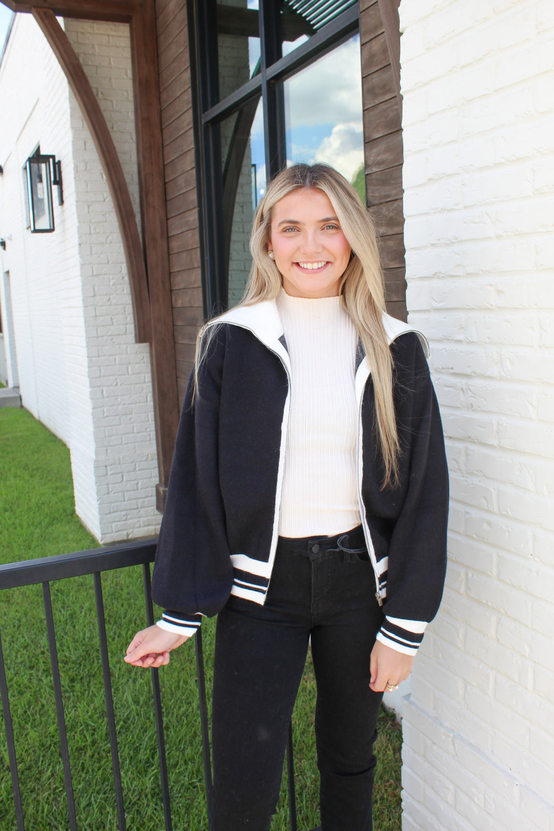 THE HERITAGE COLLARED ZIP UP SWEATER