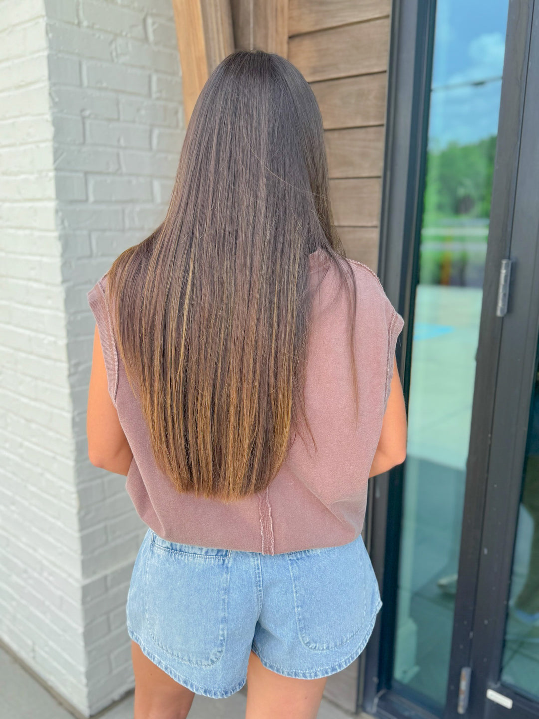 ON THE EDGE SLEEVELESS TEE