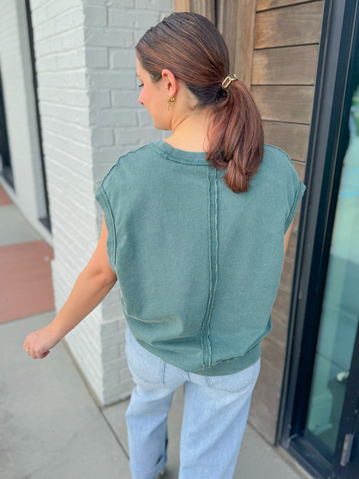 ON THE EDGE SLEEVELESS TEE