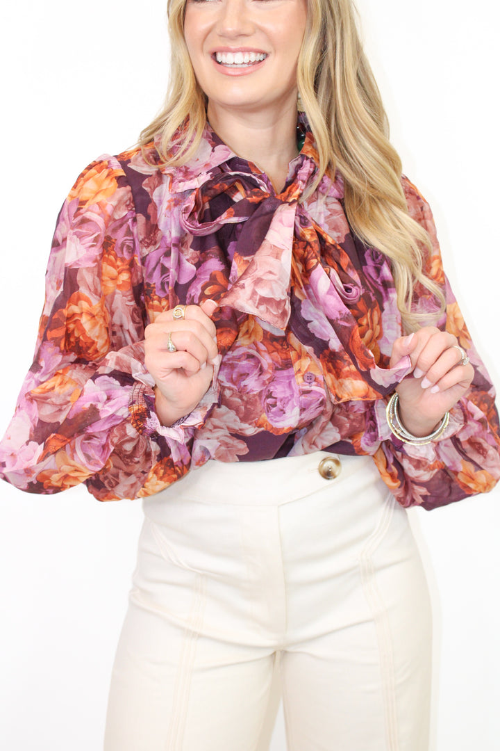 ALL TIED UP PURPLE FLORAL BLOUSE