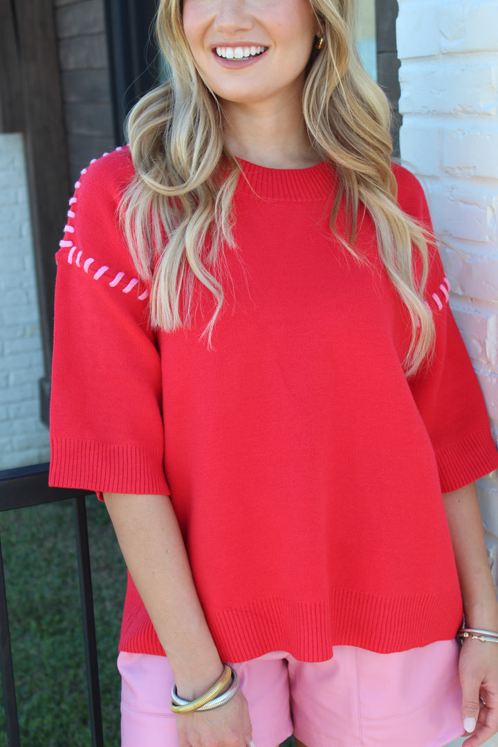 THE INSIDE OUT SHORT SLEEVE KNIT TOP